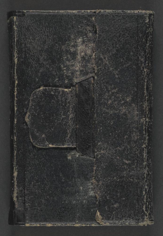 Front cover of the diary, black leather with a tab closure